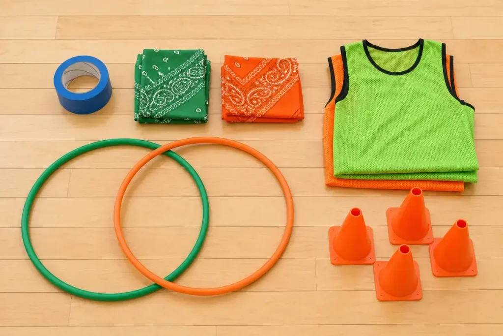 Indoor capture the flag gear: floor tape, bandana flags, pinnies, hoops, and cones
